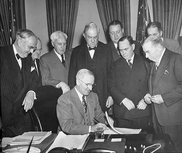 Truman signs the Economic Cooperation Act (the Marshall Plan) into law.